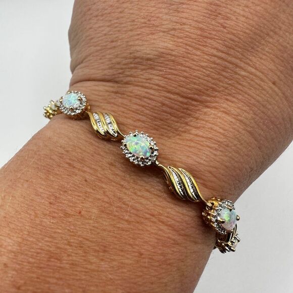 7" Lab created opal and diamond accent tennis bracelet in gold over 925! - Picture 7 of 16